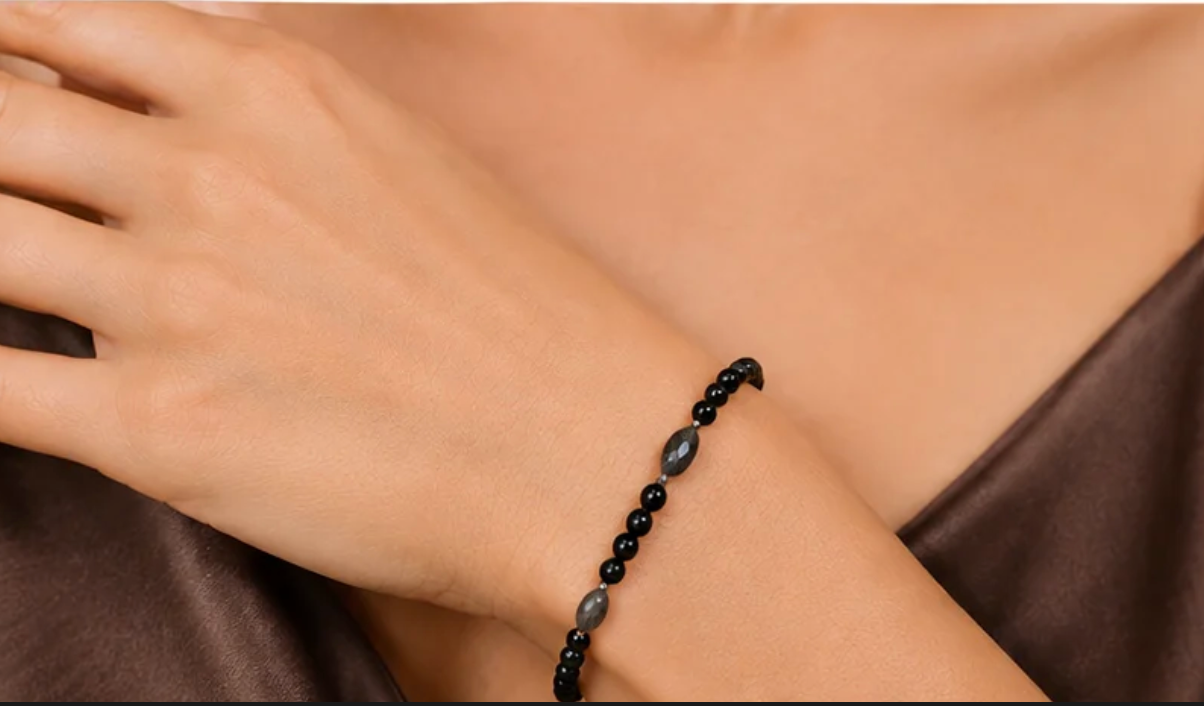 Hand knotted black pearl & gem bracelet